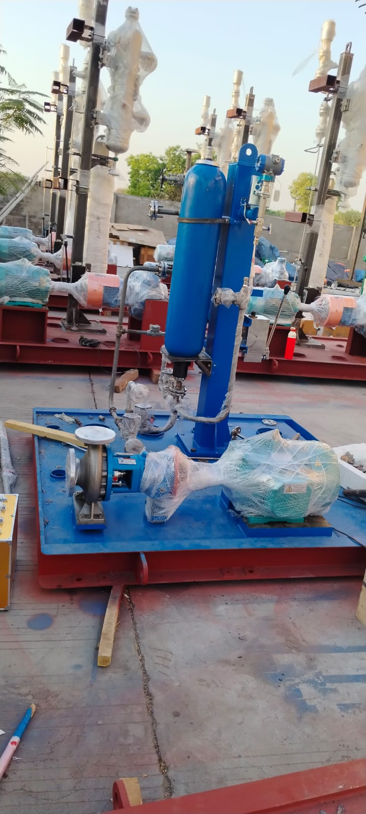 A compact vertical pump skid system featuring integrated filtration, valves, piping, and motor assembly. Mounted on a heavy steel base for stability, this unit is ideal for fluid circulation, cooling, and process transfer applications.